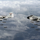 US Navy Grumman A-6A Intruders from Attack Squadron 196 (VA-196) “Main Battery” flying from the carrier USS Constitution (CVW 14) drop Mk 82 500-pound bombs over Vietnam in 1968. (US Navy)